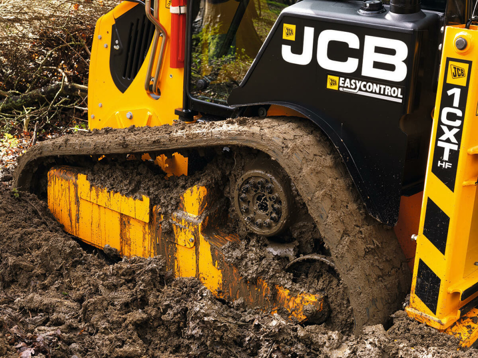 Экскаватор-погрузчик JCB 1CXT, мощность двигателя 36.6 кВт, эксплуатационная масса 4342 кг