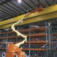 Самоходный коленчатый подъемник JLG E400AN, грузоподъемность 230 кг, рабочая высота 14.19 м, тип питания электрический, АКБ