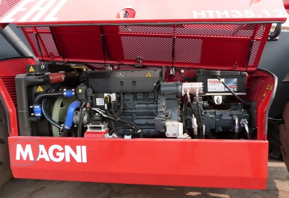 Тяжелый телескопический погрузчик MAGNI HTH 35.12, грузоподъемность 35000 кг